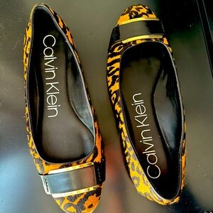 Calvin Klein ballets flats, animal print.Size 10.very attractive design elegant.
